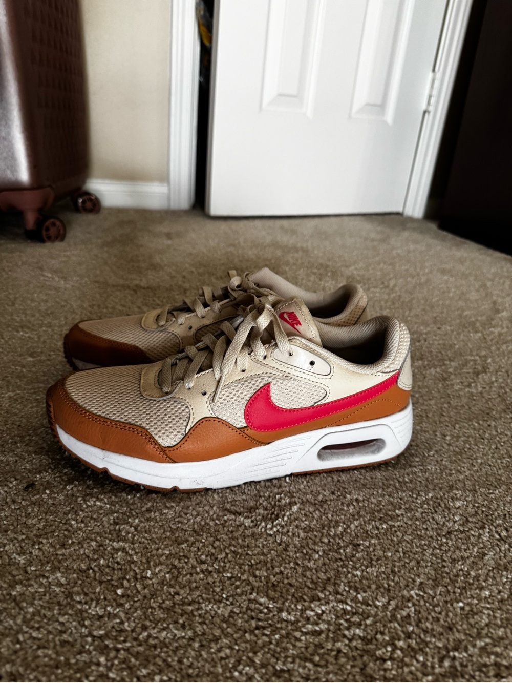 Nike Air Max Beige and Tan Sneakers with Pink Swoosh
